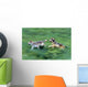 Two Wolves Running Through Meadow Wall Mural