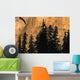 Tree Silhouettes In Front Of Cliff Face Wall Mural