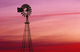 Windmill Silhouette Against Coloured Sky Wall Mural