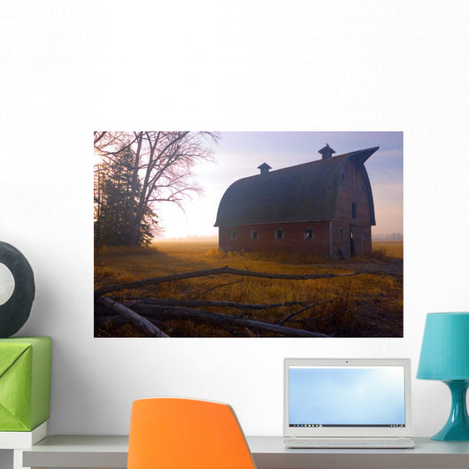 A Barn Sits In Morning Mist Wall Mural