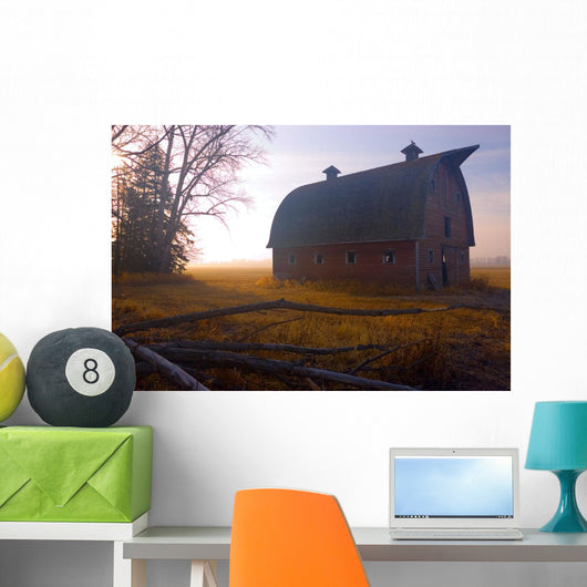 A Barn Sits In Morning Mist Wall Mural