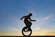 Man On Unicycle Wall Mural