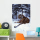 Siberian Tiger Lying On Mound Of Snow In Forest Wall Mural