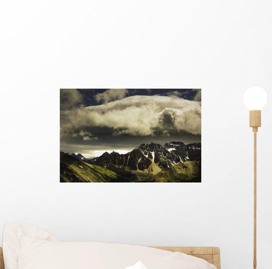 Patches Of Light Above Mountain Range Wall Mural