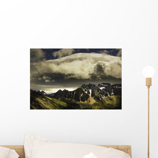 Patches Of Light Above Mountain Range Wall Mural