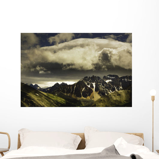 Patches Of Light Above Mountain Range Wall Mural