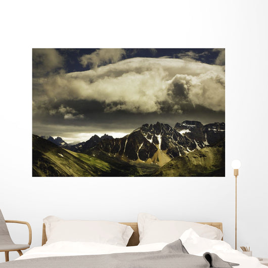 Patches Of Light Above Mountain Range Wall Mural