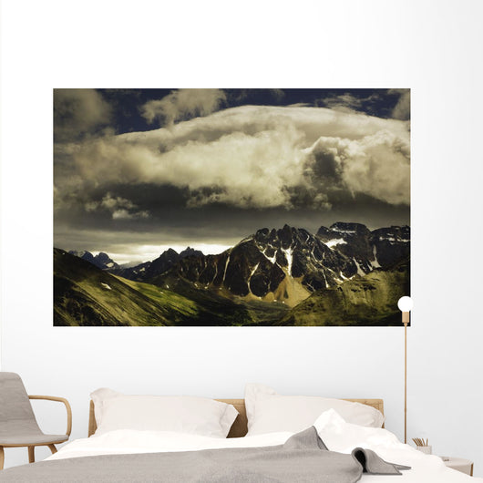 Patches Of Light Above Mountain Range Wall Mural