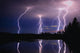 Lightning Storm Over A Lake Wall Mural