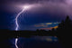 Lightning Storm Over A Lake Wall Mural