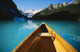 Canoe On Lake Louise In Alberta, Canada Wall Mural