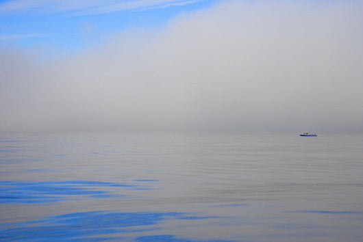 Fishing Boat Out On Water Wall Mural