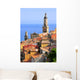 Basilica of St. Michael the Archangel and roofs of Menton in France Wall Mural