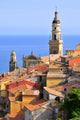 Basilica of St. Michael the Archangel and roofs of Menton in France Wall Mural