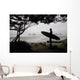 Silhouette Of A Surfer Looking Out To The Water From The Beach Wall Mural