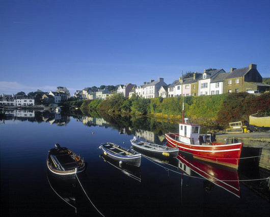 Boats Moored At A Harbor Wall Mural