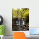 Low Angle View Of A Waterfall In A Forest Wall Mural