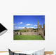 Old Ruins Of An Abbey With A Castle In The Background Wall Mural