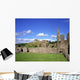 Old Ruins Of An Abbey With A Castle In The Background Wall Mural