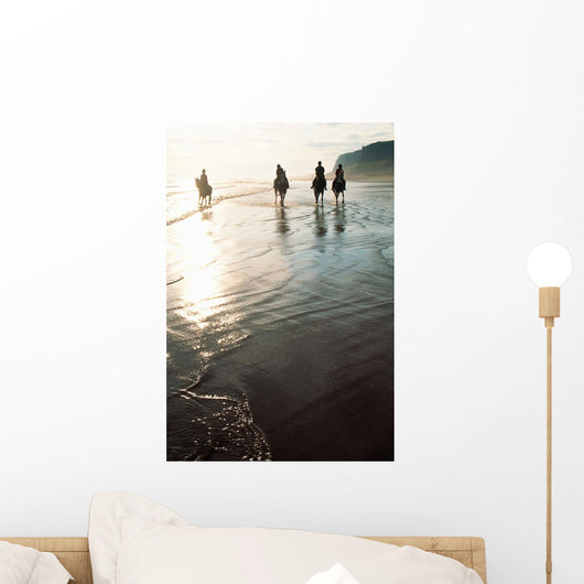 Four People Horseback Riding On A Coastal Beach, Ireland Wall Mural