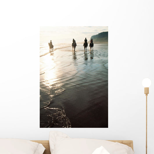 Four People Horseback Riding On A Coastal Beach, Ireland Wall Mural