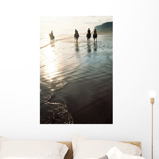 Four People Horseback Riding On A Coastal Beach, Ireland Wall Mural