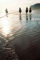 Four People Horseback Riding On A Coastal Beach, Ireland Wall Mural