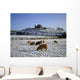 Sheep On A Snow Covered Landscape In Front Of A Castle Wall Mural
