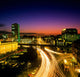 High Angle View Of Traffic Moving In A City At Dusk Wall Mural