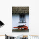 Wheelbarrow In Front Of A Window Of A Cottage Wall Mural