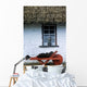 Wheelbarrow In Front Of A Window Of A Cottage Wall Mural