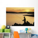 Silhouette Of A Fisherman Fishing On The Coast Wall Mural