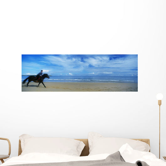Man Riding A Pony On The Beach Wall Mural
