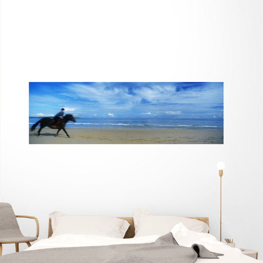 Man Riding A Pony On The Beach Wall Mural