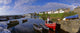 Fishing Boats Moored At A Harbor Wall Mural