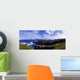 Waves Breaking On The Coast With A Light House In Background Wall Mural