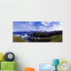 Waves Breaking On The Coast With A Light House In Background Wall Mural