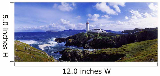 Waves Breaking On The Coast With A Light House In Background Wall Mural