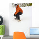 Snowboarder Going Down Snowy Hill Wall Mural