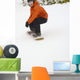 Snowboarder Going Down Snowy Hill Wall Mural