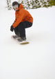 Snowboarder Going Down Snowy Hill Wall Mural