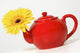 Yellow Flower In A Red Teapot Wall Mural