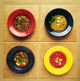 Four Plates Of Different Foods Wall Mural