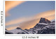 Clouds At Sunset Above Mountain Peaks Wall Mural