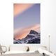 Clouds At Sunset Above Mountain Peaks Wall Mural