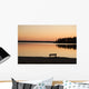 A Bench Silhouetted At Sunset Near The Lake Wall Mural