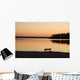 A Bench Silhouetted At Sunset Near The Lake Wall Mural