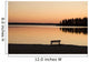 A Bench Silhouetted At Sunset Near The Lake Wall Mural