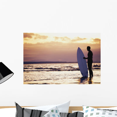 Surfer Silhouette Wall Mural shown on a wall