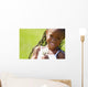 Little Girl Holding Weeds Wall Mural